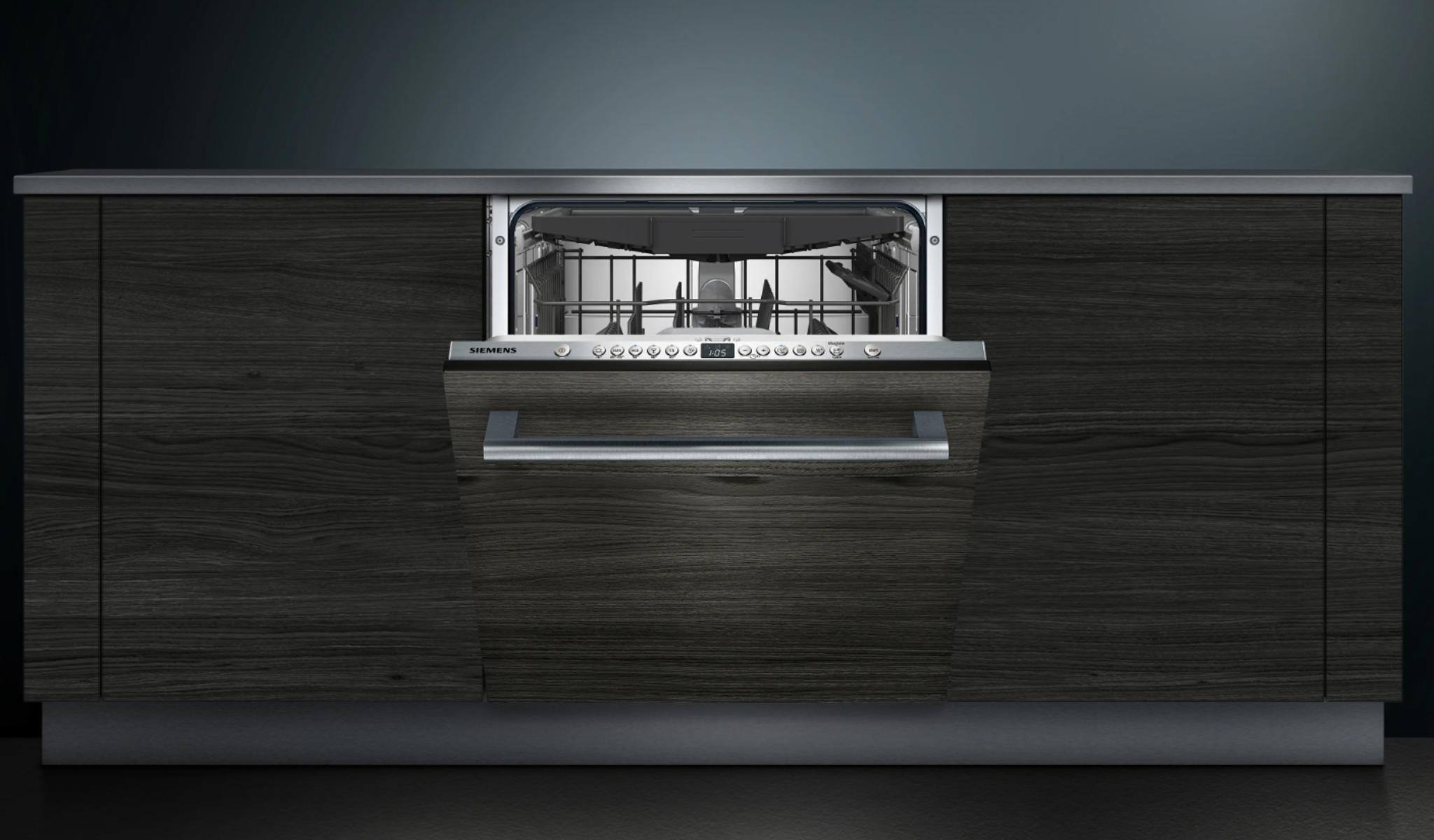 Wbudowana zmywarka, otwarta, z drewnianą szafką.