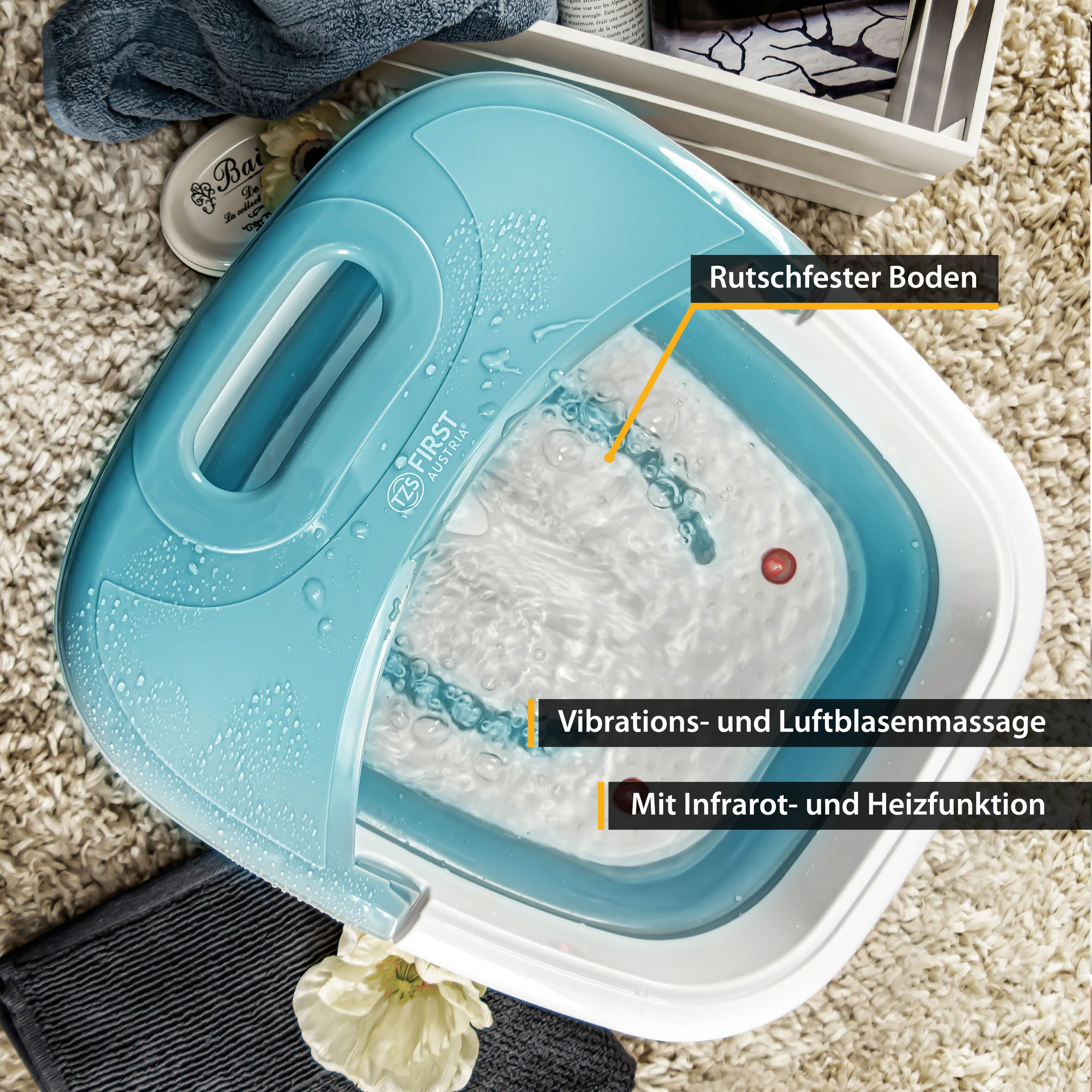 Fußbad mit Wasser, Blasen und Heizfunktion. Beschriftet: 'Vibrationen und Luftblasenmassage'.