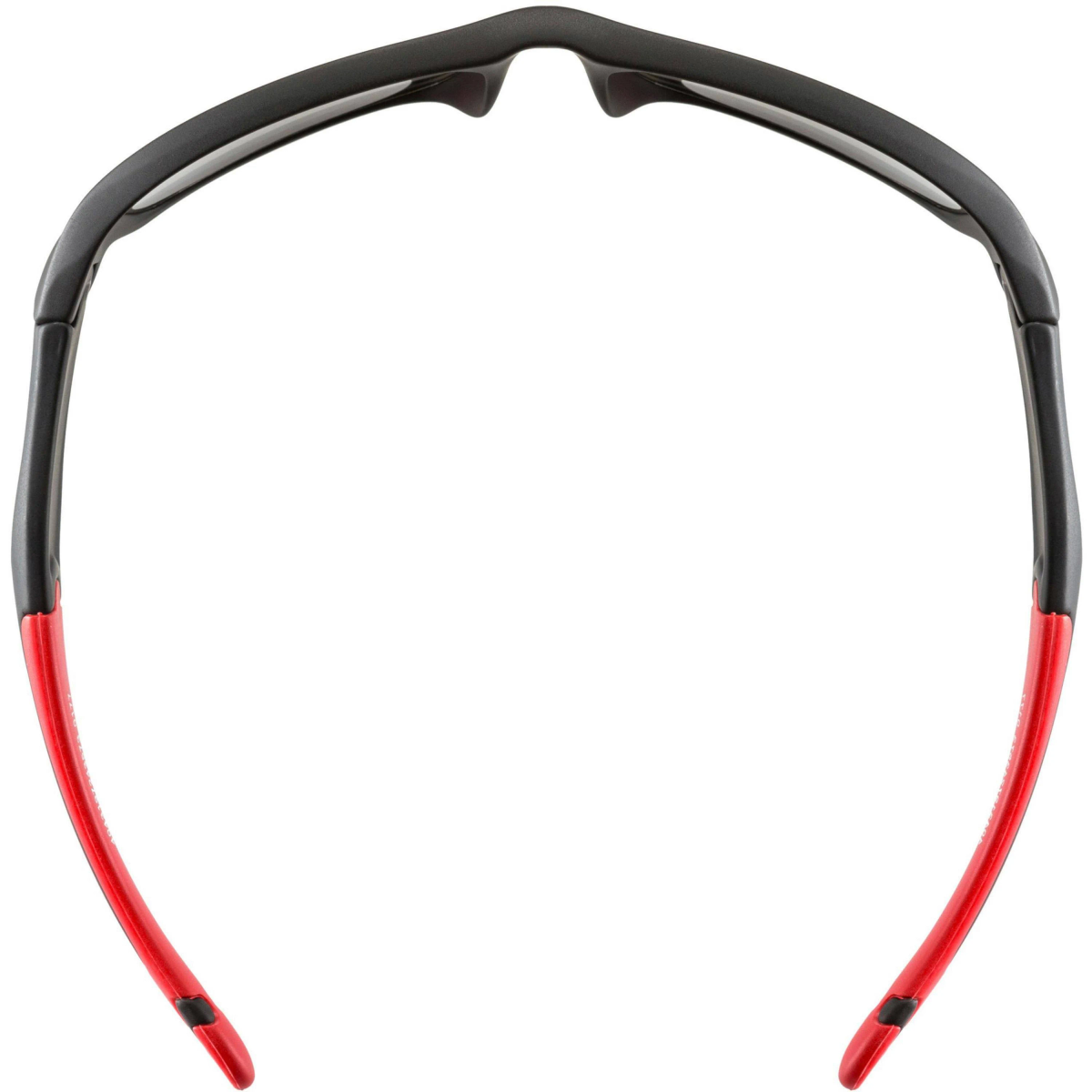 Schwarze Sonnenbrille mit roten Bügeln. Die Brille wird von oben betrachtet und zeigt die Oberseite des Rahmens.