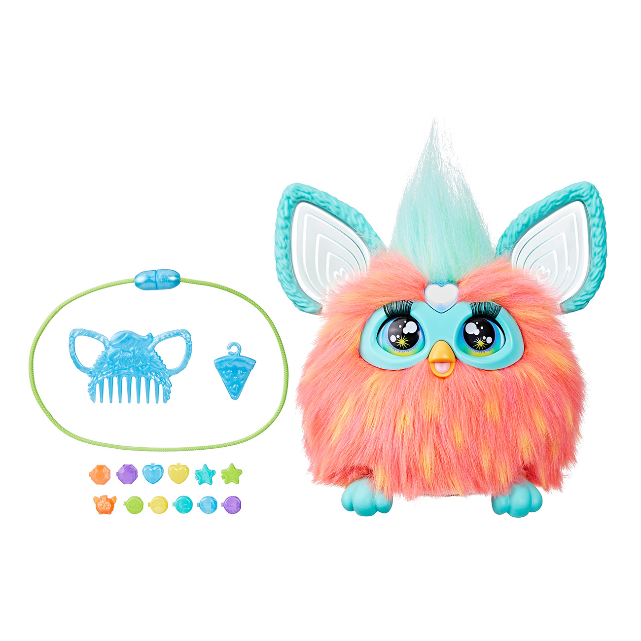 Buntes Furby-Spielzeug mit Zubehör, inkl. Kamm und Perlen, auf weißer Oberfläche.