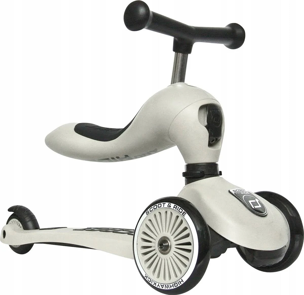 Un trotteur pour enfants beige à trois roues avec siège.