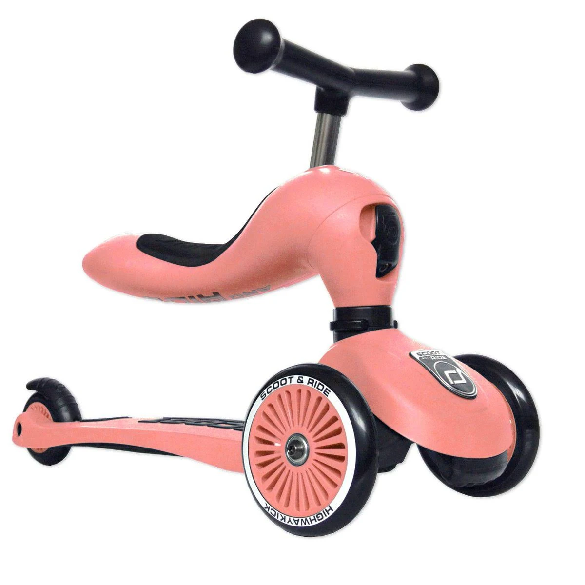 Scooter rosa. Manubrio e sedile neri. Tre ruote. 'SCOOT & RIDE' e 'HIGHWAYKICK'.