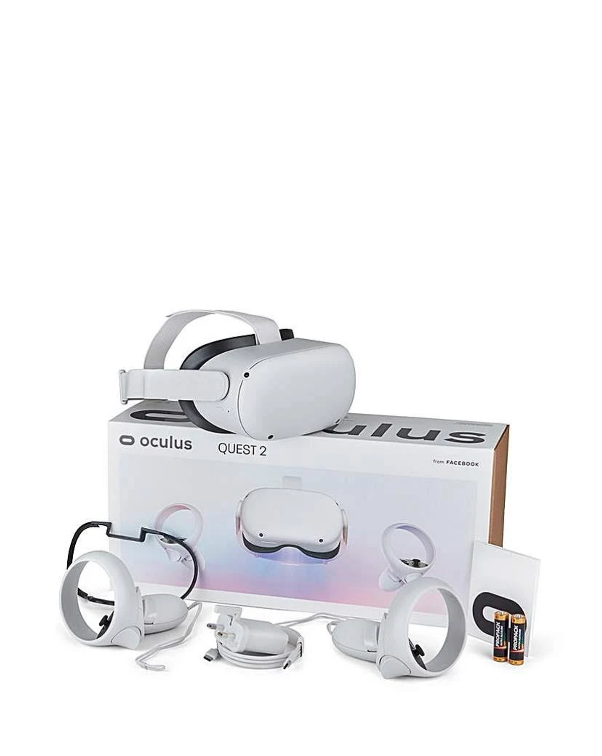 Ein VR-Headset und Controller mit Zubehör und Box auf weißer Oberfläche, weißer Hintergrund.