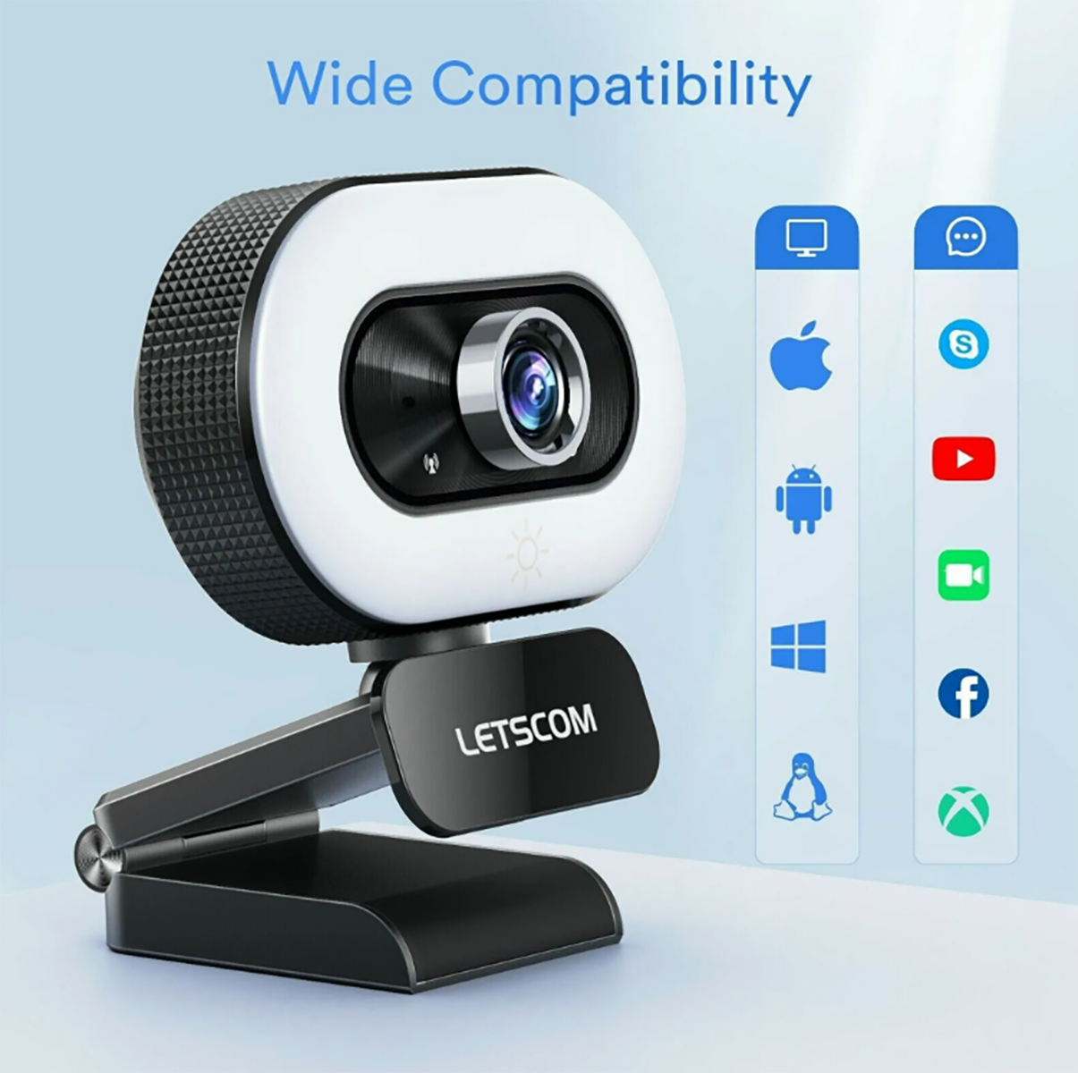 Webcam mit dem Text 'Wide Compatibility' und Anwendungssymbolen. Die Webcam ist schwarz und weiß.