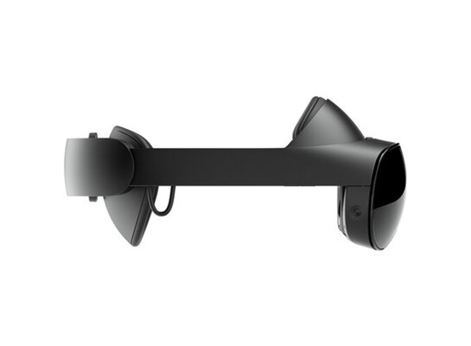 Draufsicht auf ein schlankes, schwarzes VR-Headset auf weißem Hintergrund.