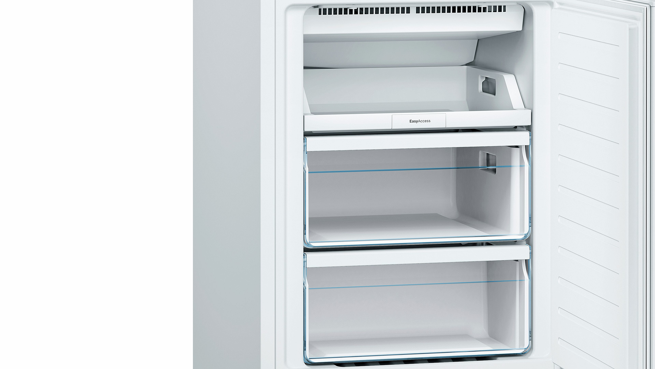 Congelador de un refrigerador blanco. Dos cajones vacíos con la puerta abierta.