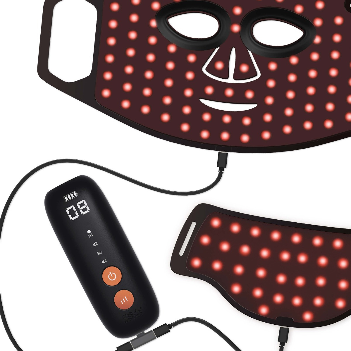 Eine schwarze Gesichtsmaske mit roten Lichtern und ein schwarzer Controller mit Digitalanzeige.
