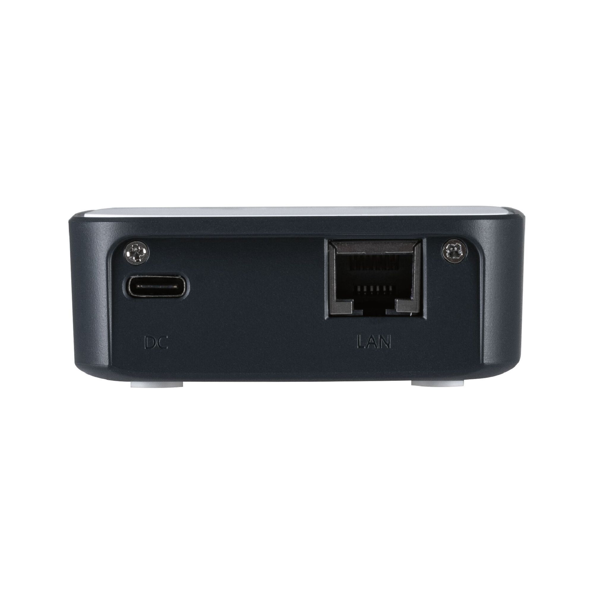 Zbliżenie małego czarnego urządzenia z portami DC, LAN i USB-C.