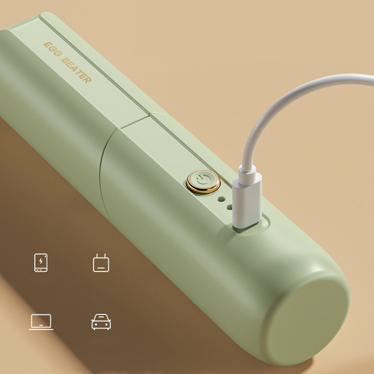 Grüner Eierschläger mit eingestecktem Ladekabel, mit Strom- und Ladesymbolen.