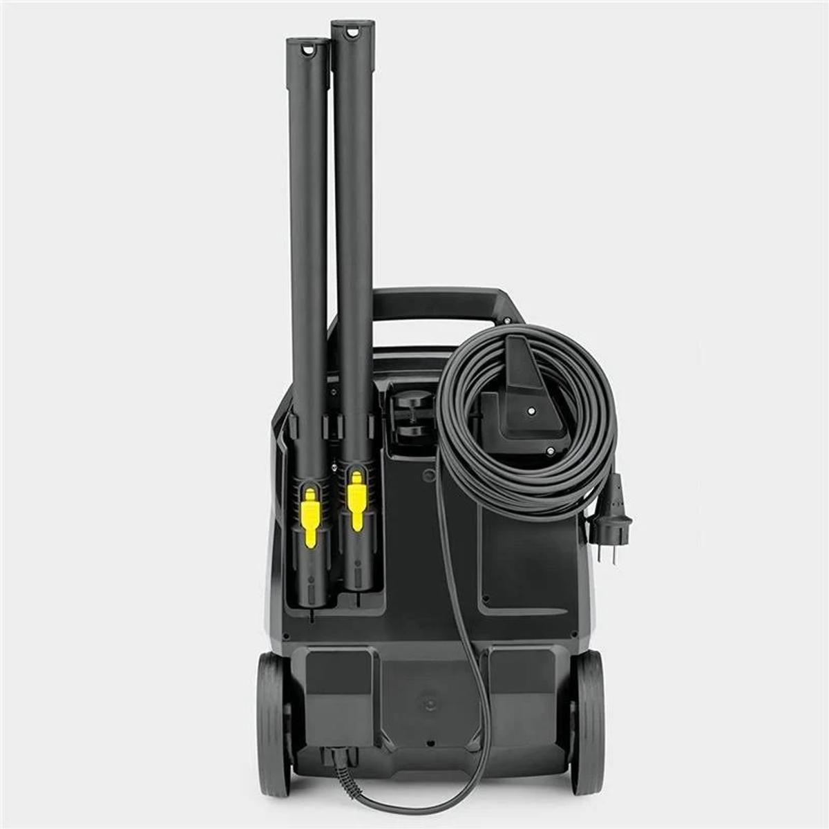 Widok z tyłu myjki ciśnieniowej. Widoczne są dwie lance spryskujące, przewód i uchwyt.