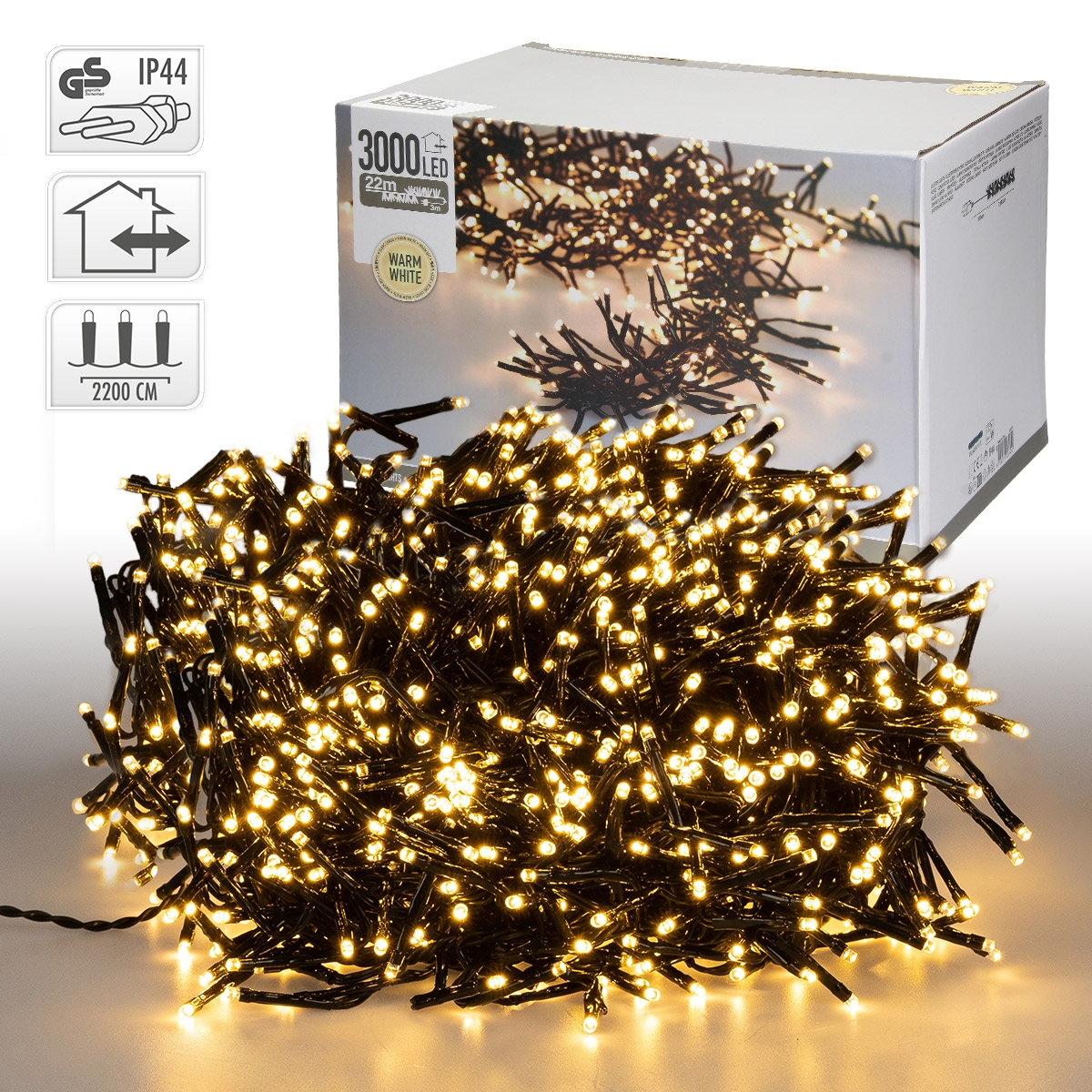 Weihnachtslichter in einer Schachtel. Die Lichter sind gelb und weiß. Die Schachtel ist weiß mit Text.