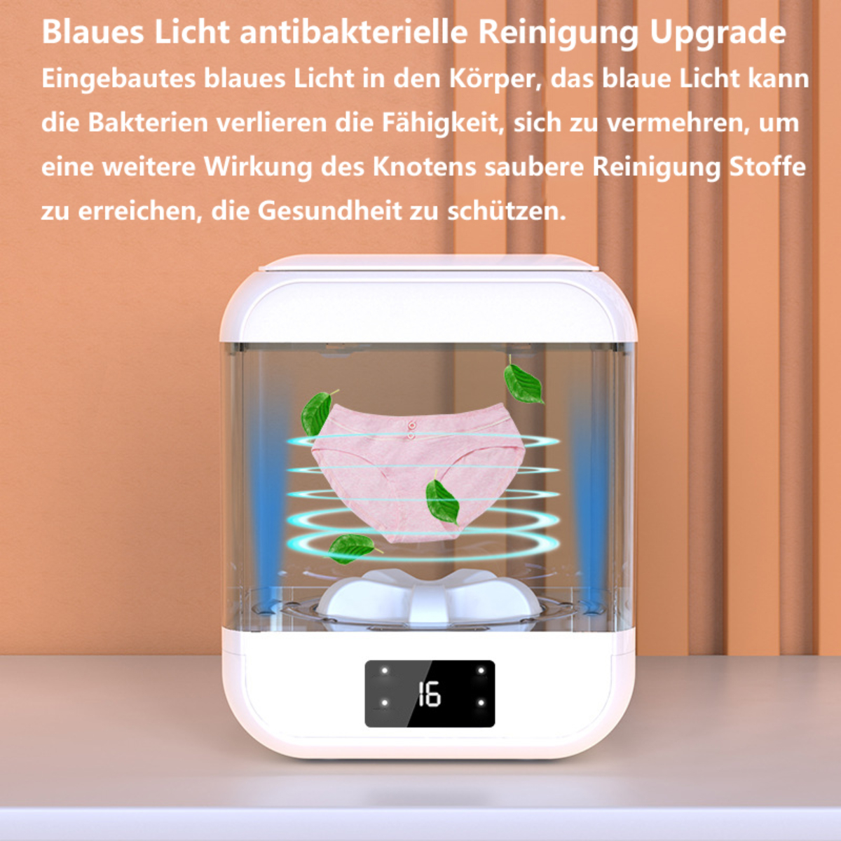 Ein weißer Sterilisator mit rosa Unterwäsche. Der Bildschirm zeigt 16. Es gibt grüne Blätter.