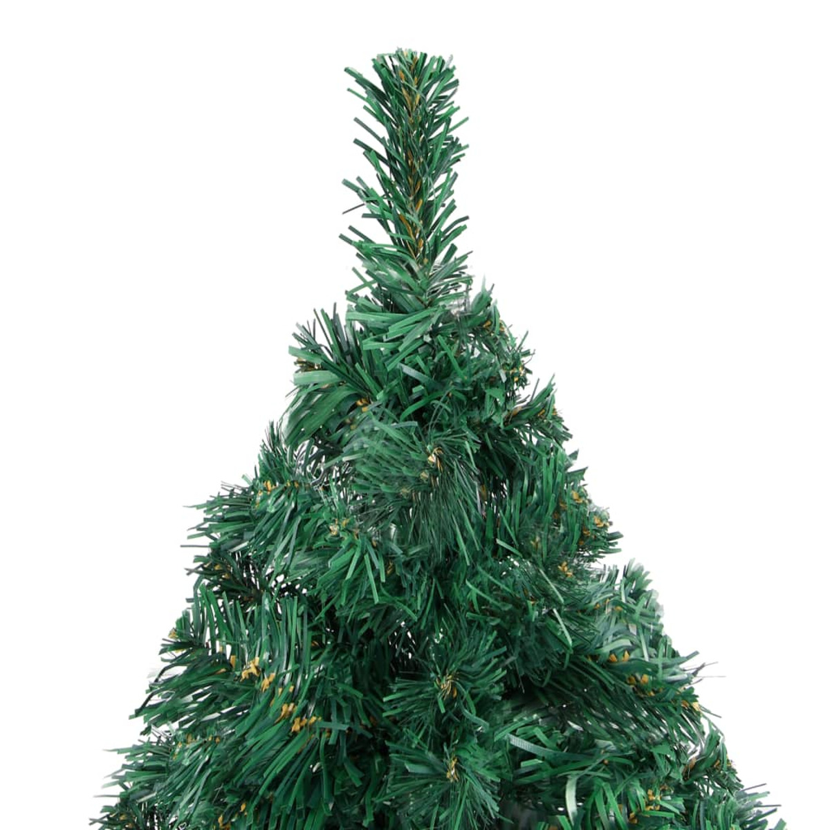 Oberteil eines grünen künstlichen Weihnachtsbaums. Die Äste sind dicht und spitz.