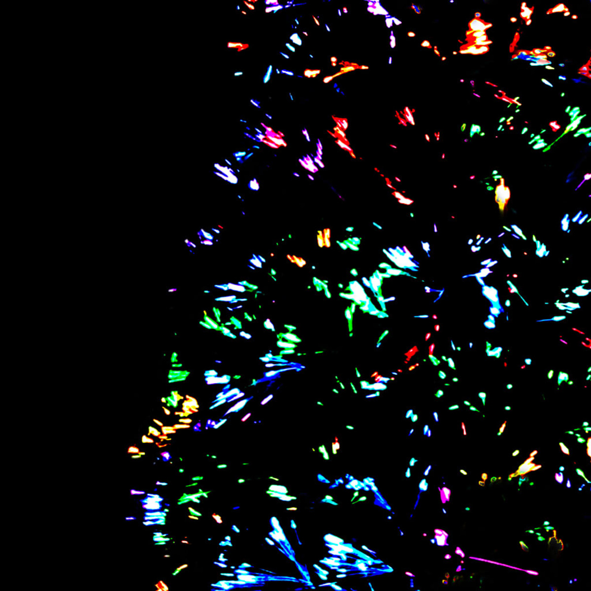 Dunkler Hintergrund mit bunten, verstreuten Lichtstreifen in Grün, Blau, Rot und Gelb, die ein lebendiges, abstraktes Design erzeugen.