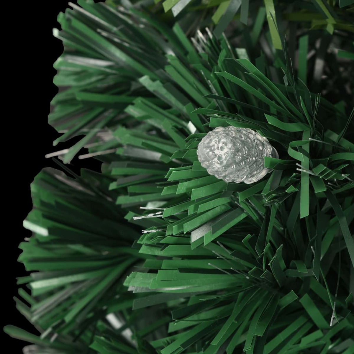 Nahaufnahme eines grünen Weihnachtsbaums mit transparentem Licht.