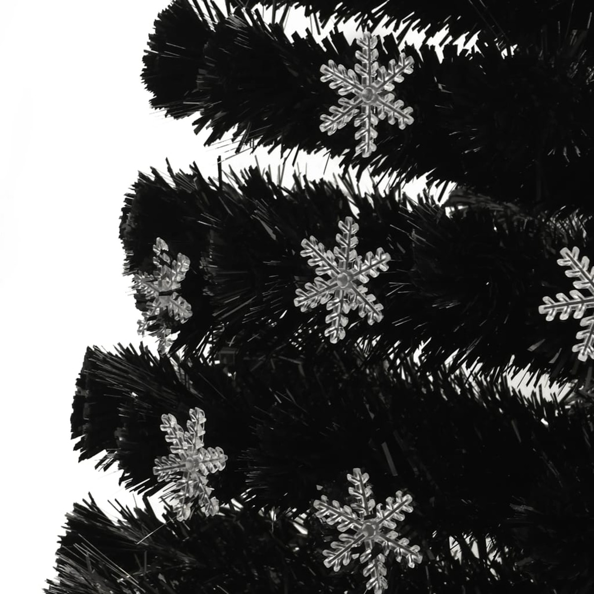 Nahaufnahme eines schwarzen Weihnachtsbaums mit silbernen Schneeflocken-Ornamen.