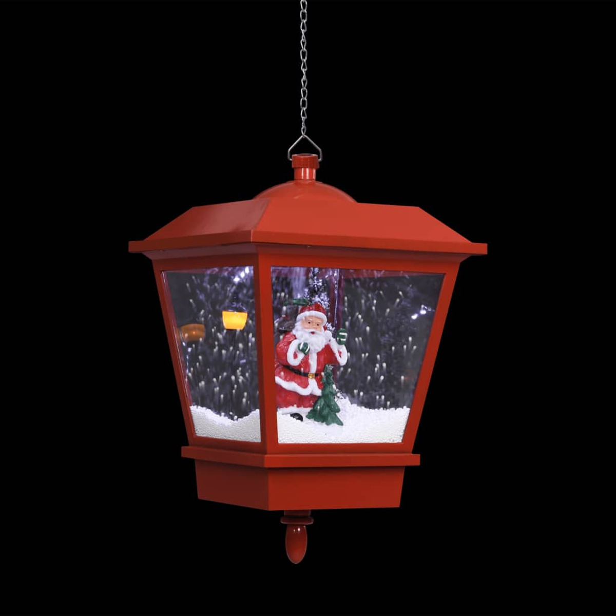 Eine rote Weihnachtslaterne mit einer Weihnachtsmannfigur im Inneren. Der Hintergrund ist schwarz.