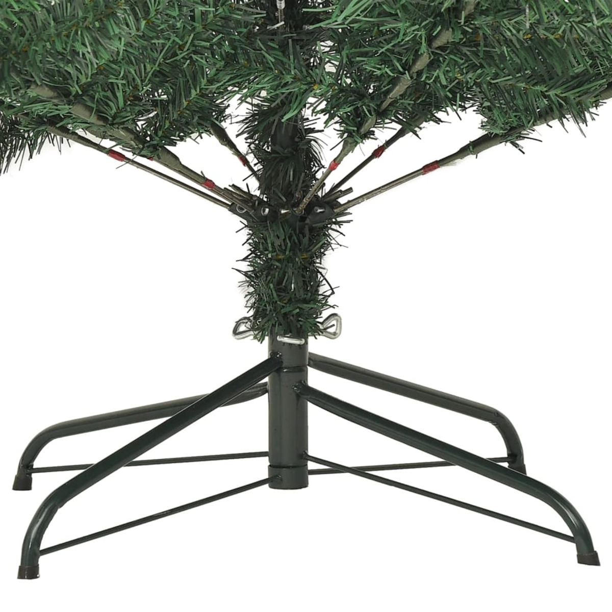 Der Fuß eines grünen Weihnachtsbaums mit Metallständer, der die Befestigungspunkte zeigt.