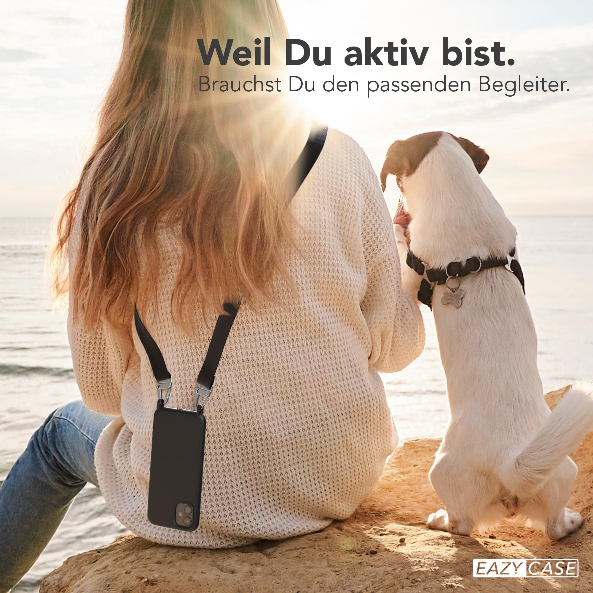 Person mit Handyhülle und Hund am Strand. Text: Weil Du aktiv bist. EAZY CASE Logo.