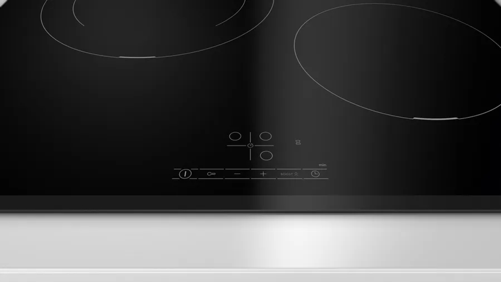 Czarna płyta indukcyjna z panelem sterowania. Widoczne dwie strefy grzewcze.