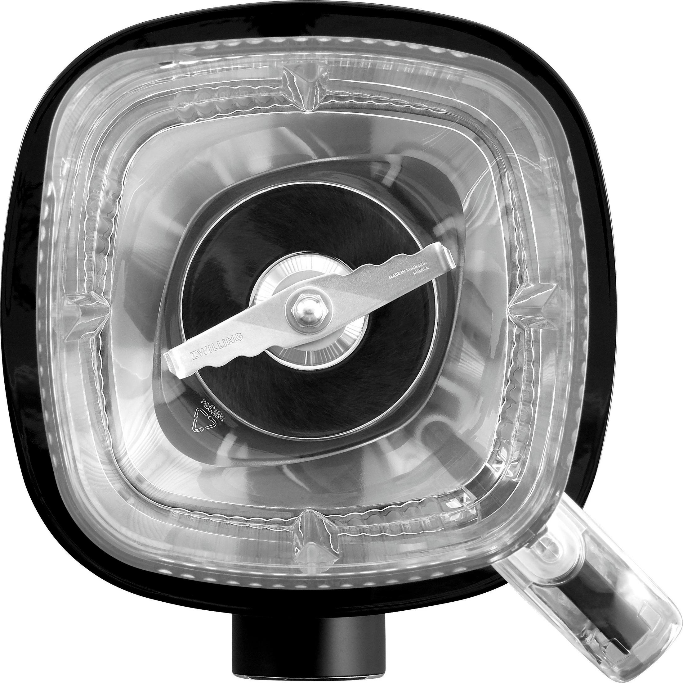 Widok z góry na blender, czarny korpus, przezroczysty pojemnik do mieszania z ostrzem i podstawą.