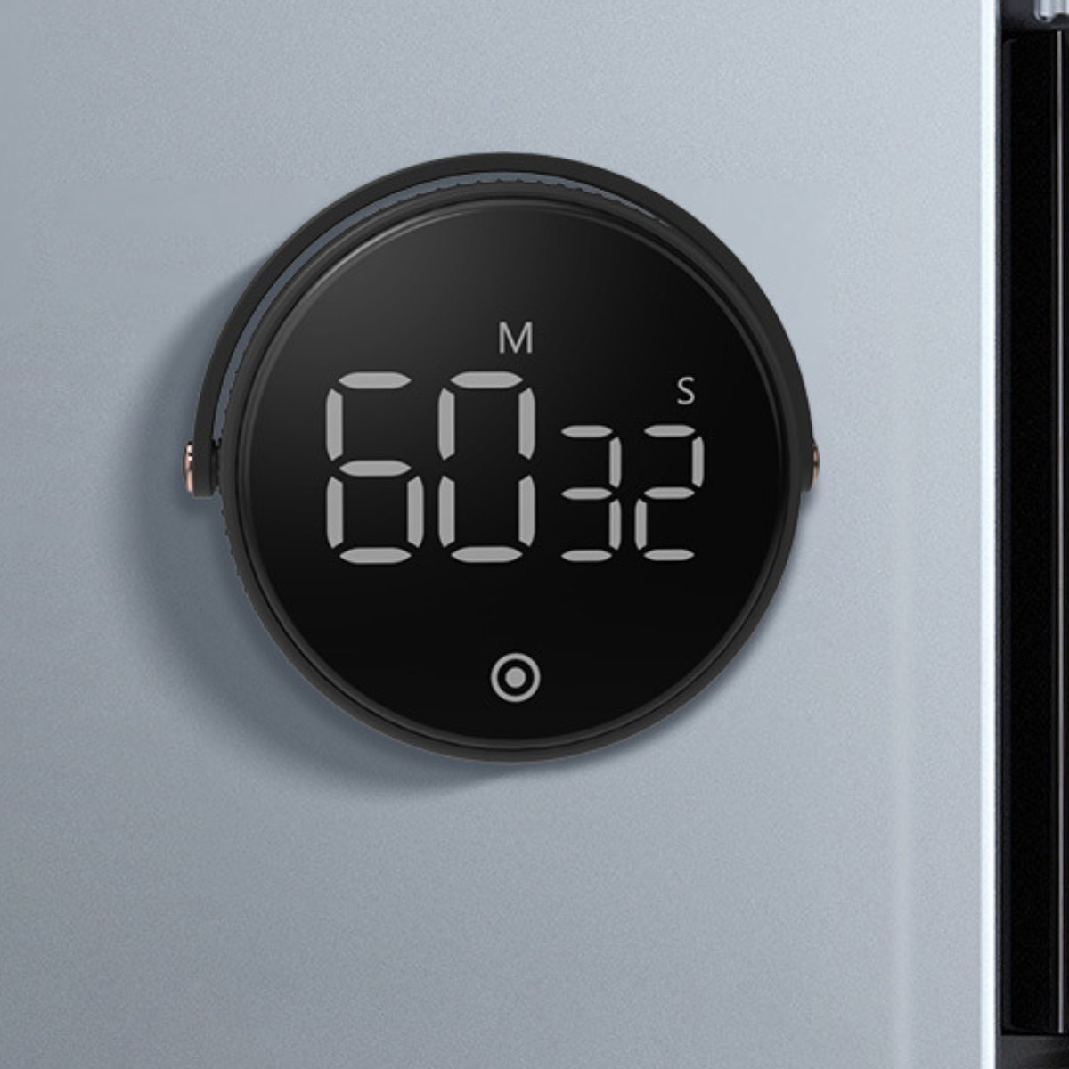 Ein schwarzer Timer mit digitaler Anzeige '60:32'. Er hat einen schwarzen Ring und einen Knopf.