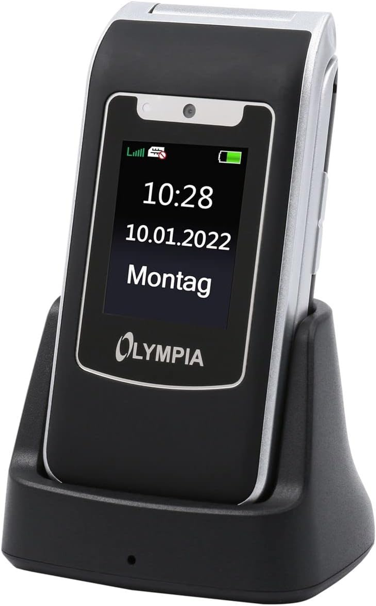 Ein Olympia-Mobiltelefon in einem Lade-Dock. Zeigt Zeit, Datum und Wochentag an.