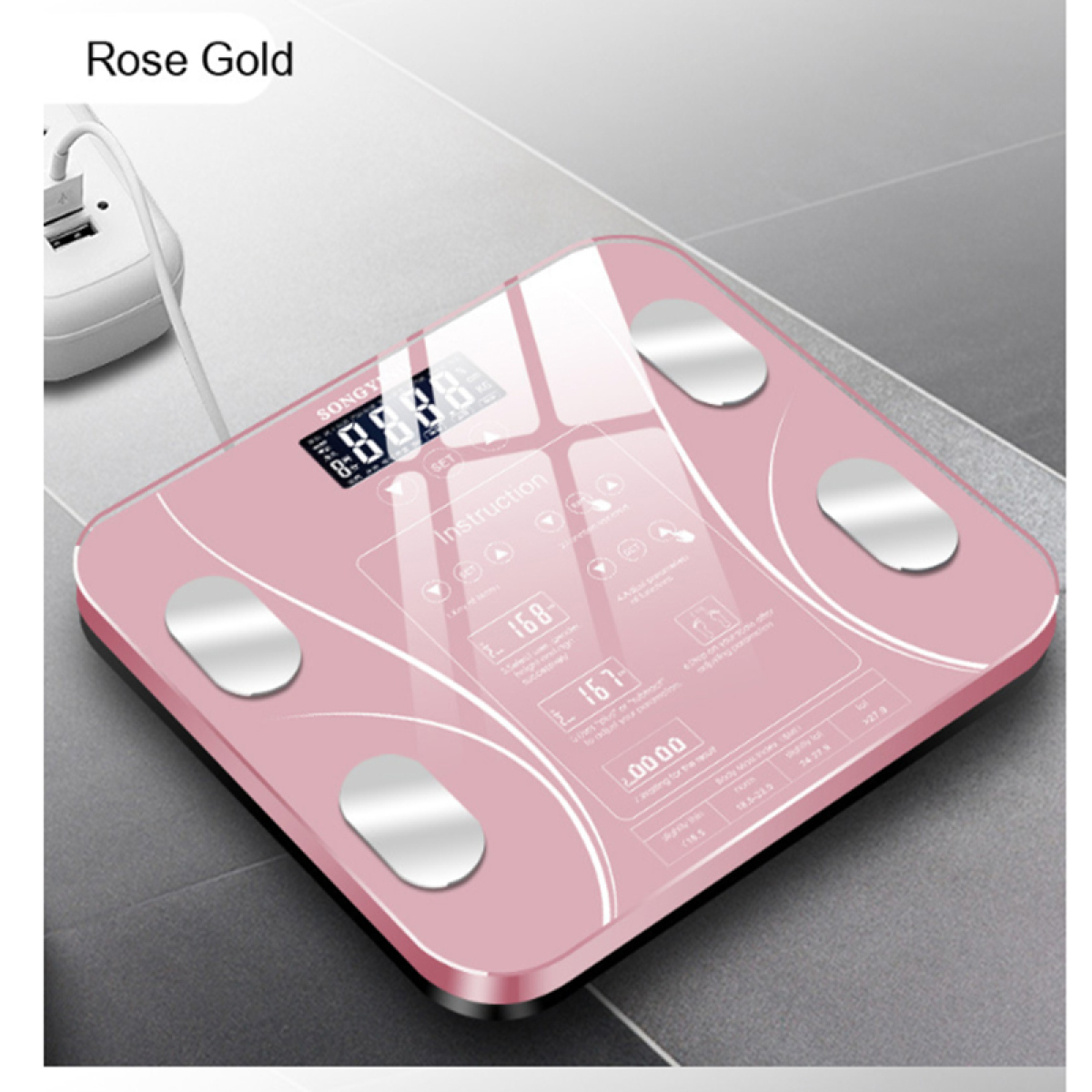 Roségoldene Digitalwaage mit Digitalanzeige und vier silbernen Fußpads.