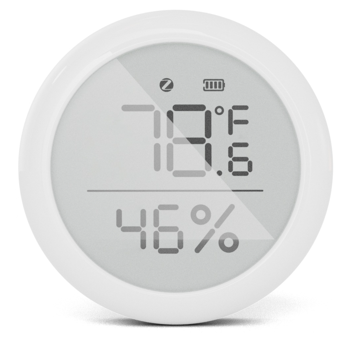 Weißes, rundes Gerät mit Digitalanzeige für Temperatur in Fahrenheit und Luftfeuchtigkeit.