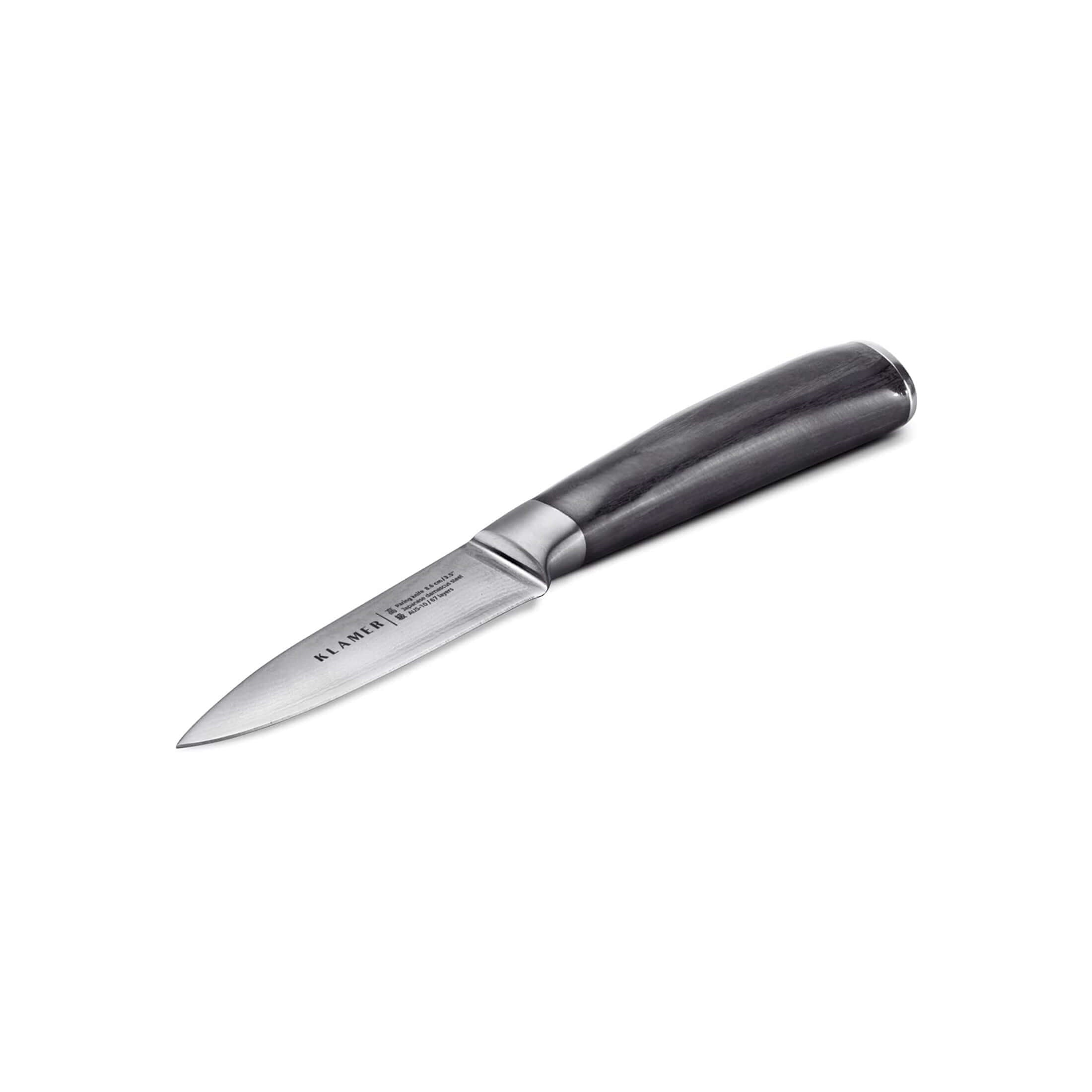 Silbernes und schwarzes Messer auf weißem Untergrund.