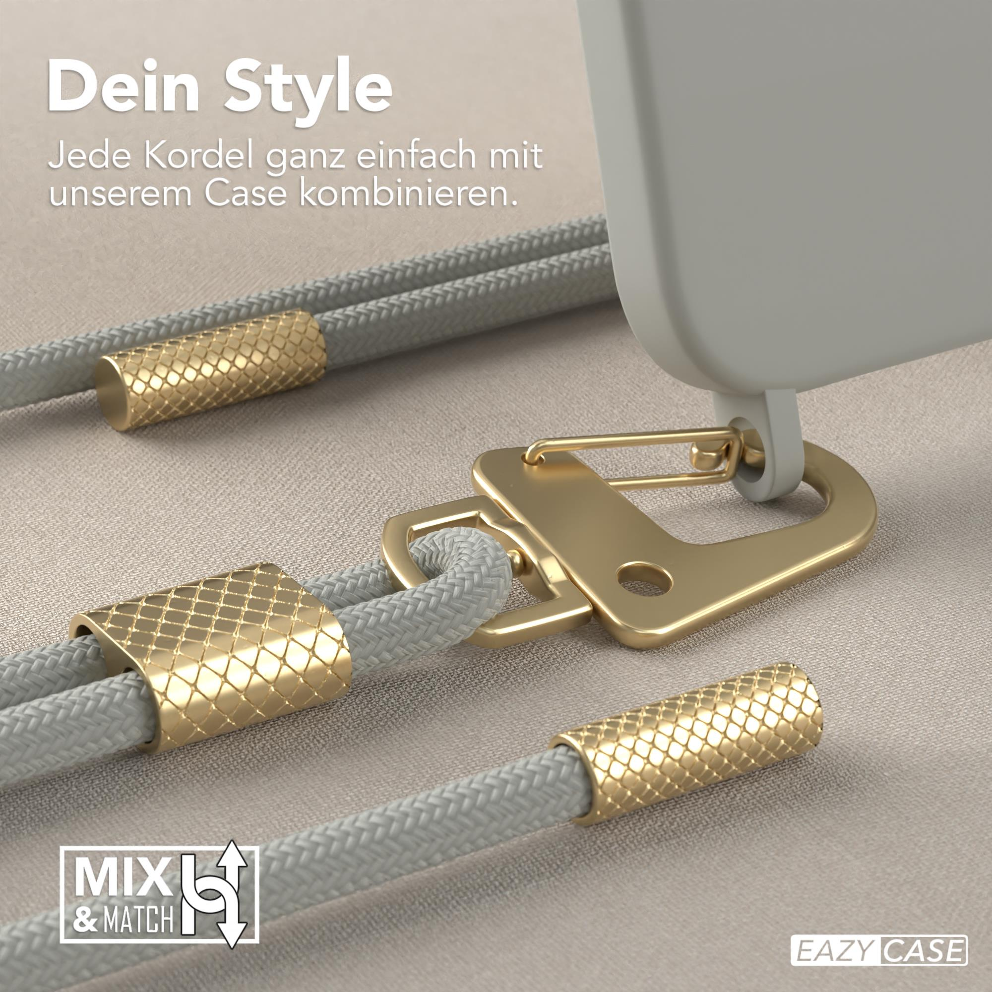 Handyhülle mit grauem Kordel und goldenen Akzenten. Das Telefon ist oben rechts.