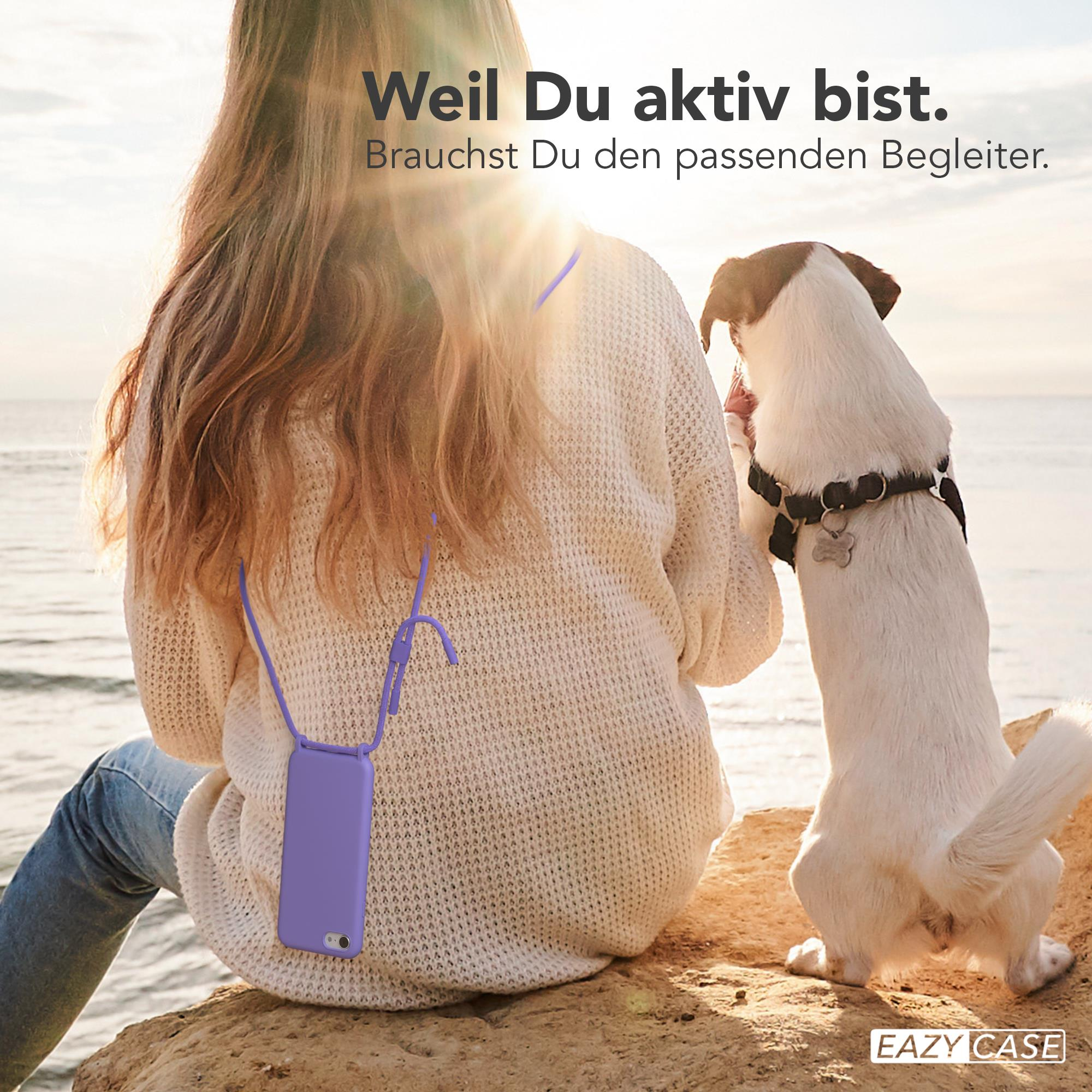 Frau und Hund posieren auf Felsen. Text: Weil Du aktiv bist. Brauchst Du den passenden Begleiter.