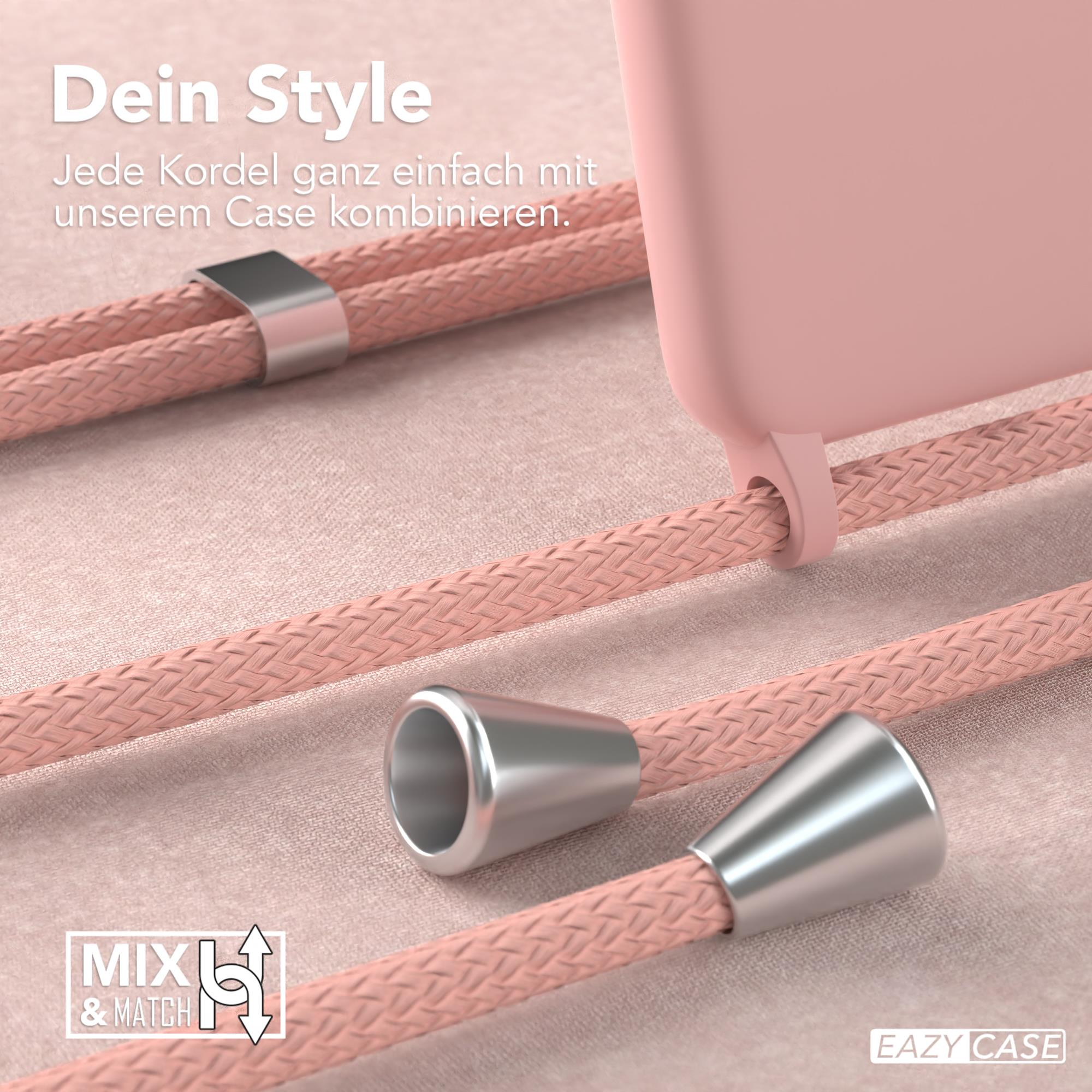 Nahaufnahme einer rosa Handyhülle mit rosa Kordel, die einen Stecker und das Mix-and-Match-Konzept zeigt.