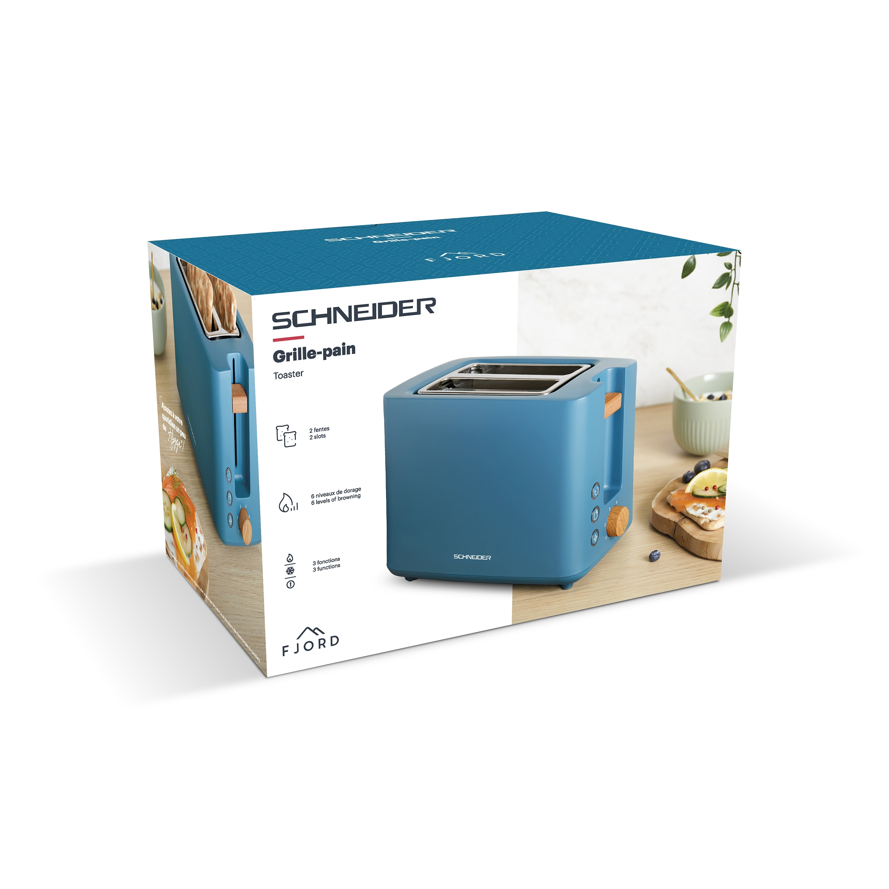 Blauer Toaster in seiner Box. Die Box zeigt ein Bild des Toasters und Essen auf einem Holztisch.