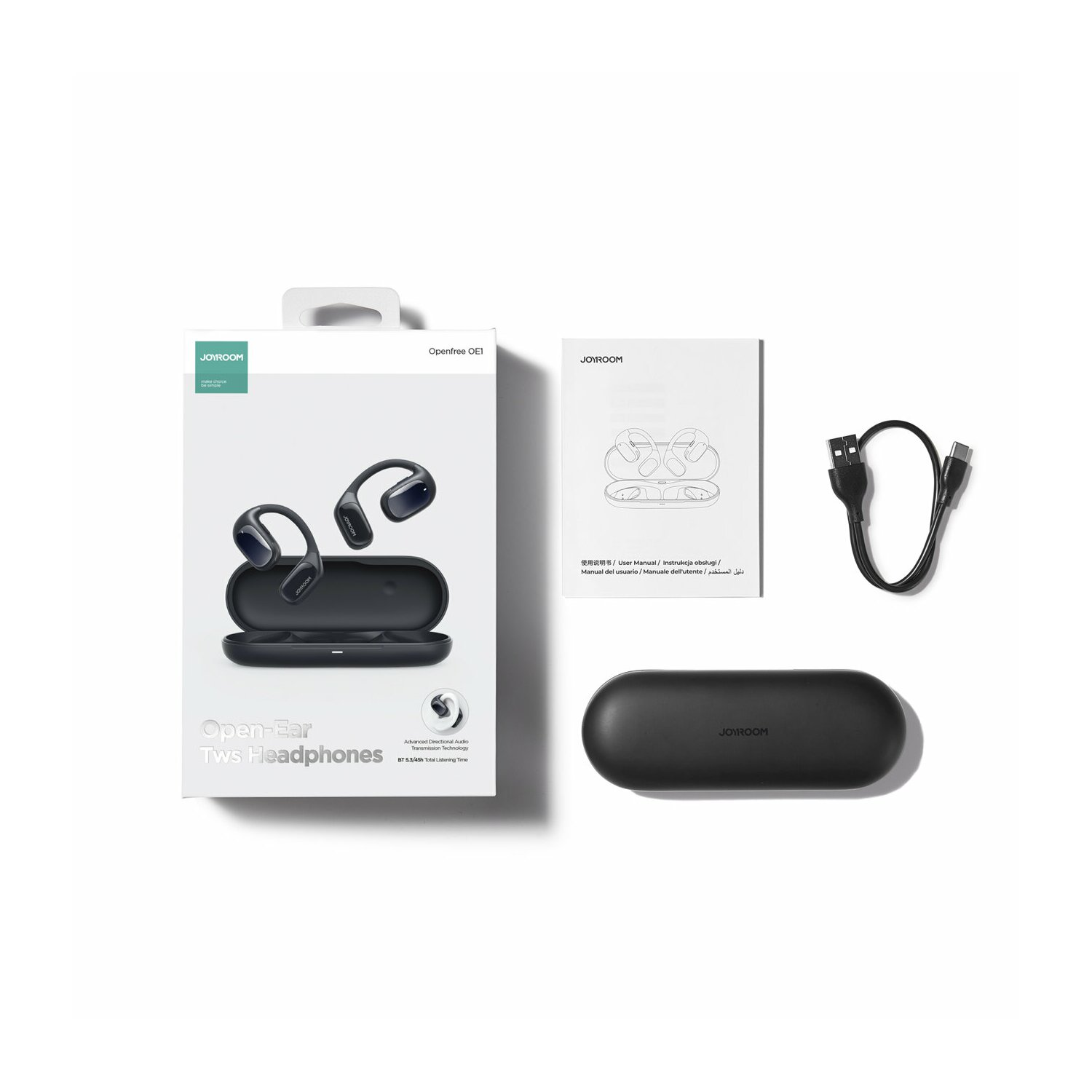 Box mit Kopfhörern, Ladegerät und Handbuch. Kopfhörer sind schwarz. Text: Open-Ear TWS Headphones, JOYROOM.