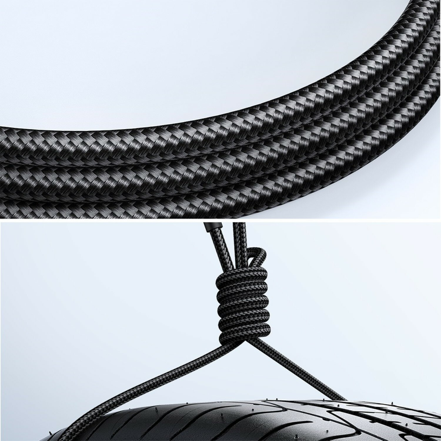 Nahaufnahme eines schwarzen geflochtenen Kabels. Das Kabel ist aufgerollt und geknotet.
