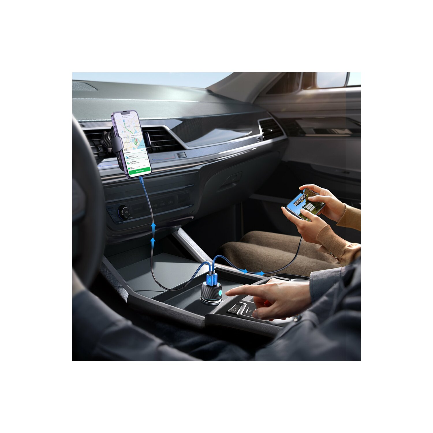 Wnętrze samochodu z telefonem na uchwycie, podłączonym do ładowarki. Osoba używa telefonu.