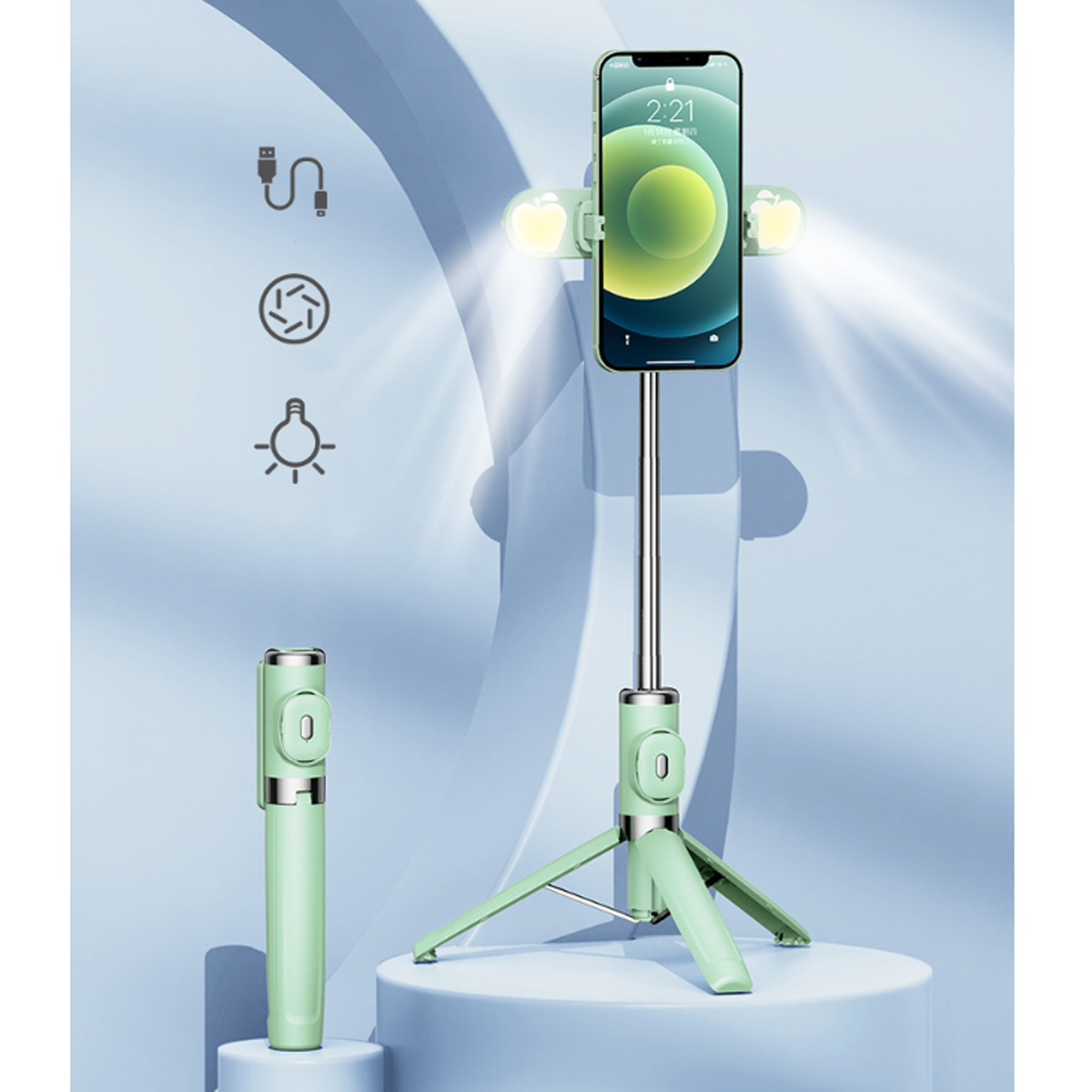 Ein grüner Selfie-Stick mit einem Telefon und zwei Lichtern. Ein Ständer und eine Fernbedienung werden ebenfalls angezeigt.