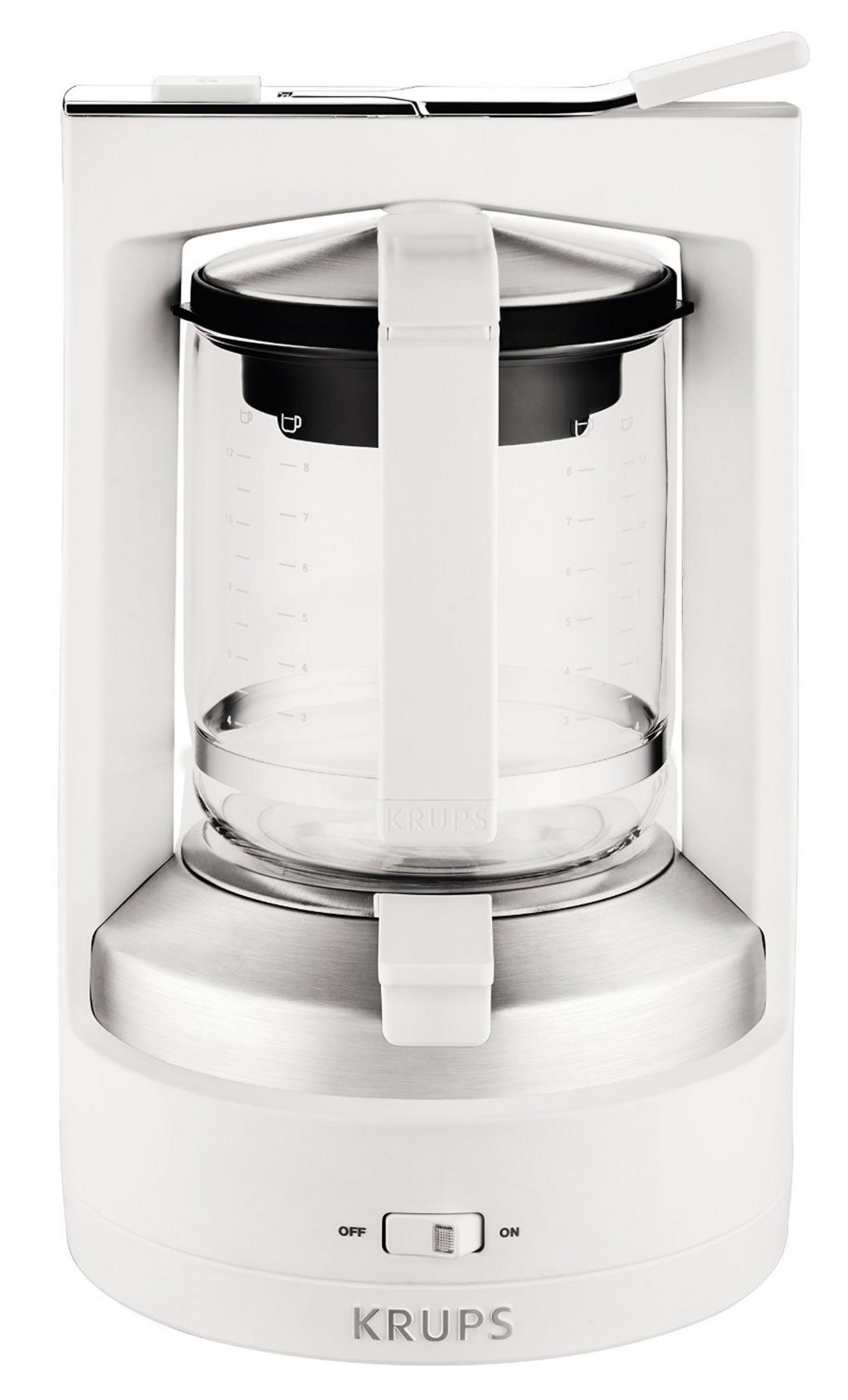 Biały ekspres do kawy Krups ze szklanym dzbankiem i białym uchwytem.
