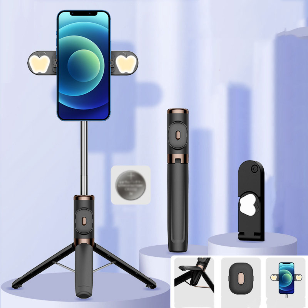 Ein Selfie-Stick mit Telefon, Lichtern und Zubehör. Das Setup steht auf weißem Untergrund.
