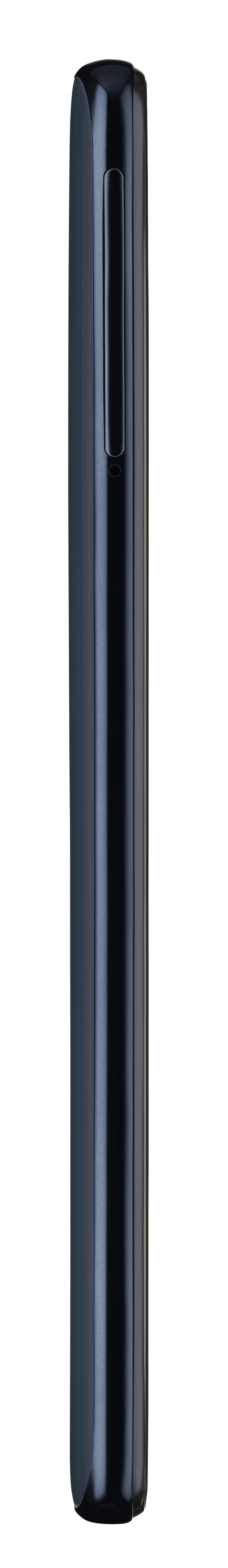 Długi, czarny, cylindryczny przedmiot, być może długopis.