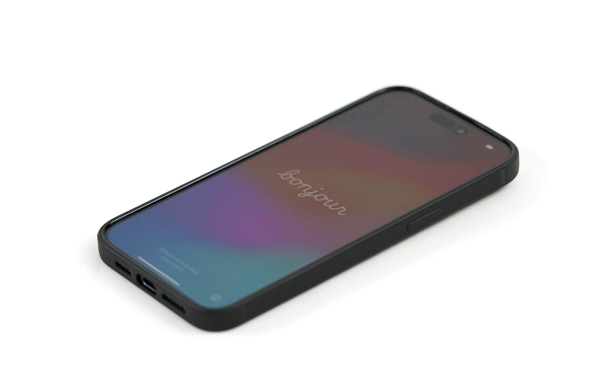 Schwarzes iPhone mit dem Wort 'bonjour' auf dem Bildschirm. Weißer Hintergrund.