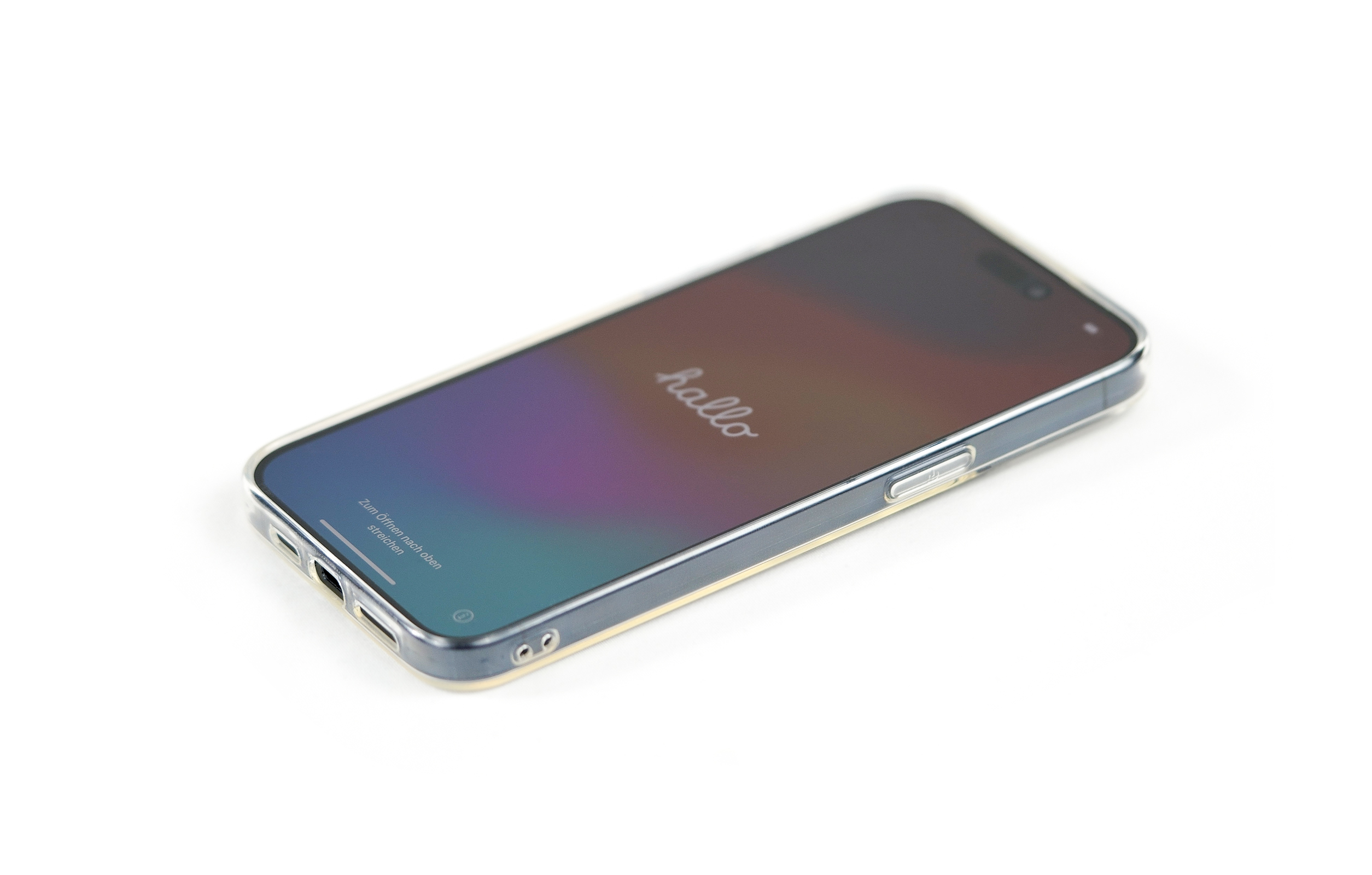 Ein iPhone in einer durchsichtigen Hülle, mit einem 'Hallo'-Bildschirm. Das Telefon liegt auf einer weißen Oberfläche.