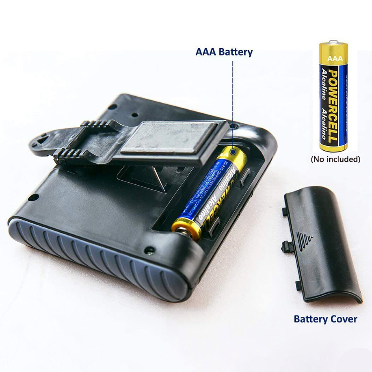 AAA-Batterie in einem Gerät. Eine Batterieabdeckung und eine zusätzliche Batterie.