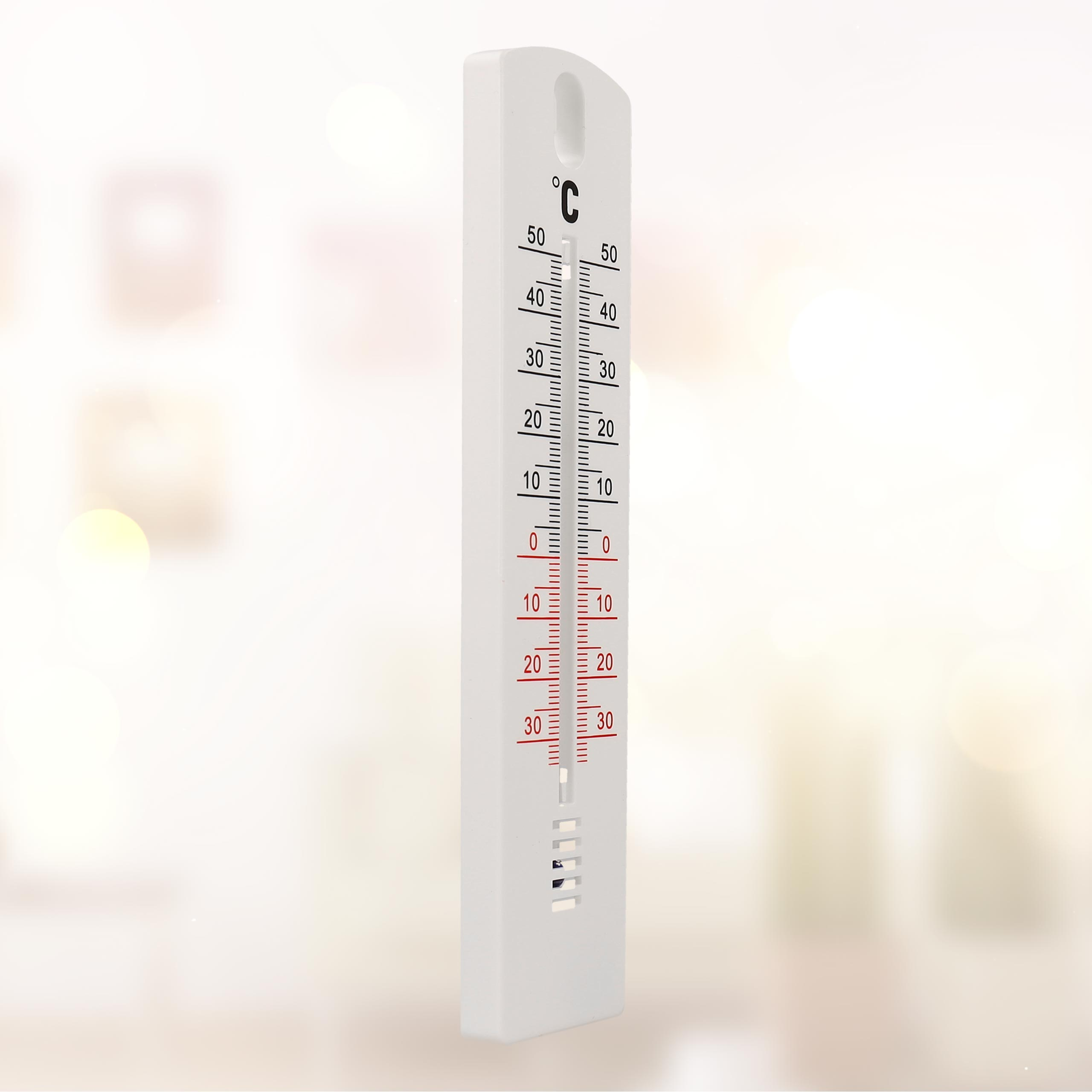 Weißes Thermometer mit roten und schwarzen Temperaturen. Skala in Celsius.