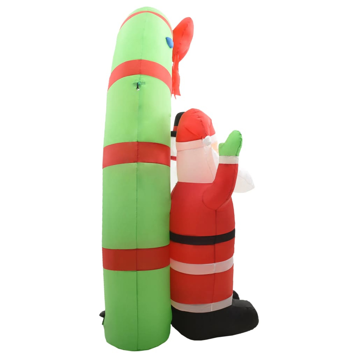 Eine aufblasbare Weihnachtsdekoration von Santa Claus und einer grünen Zuckerstange.