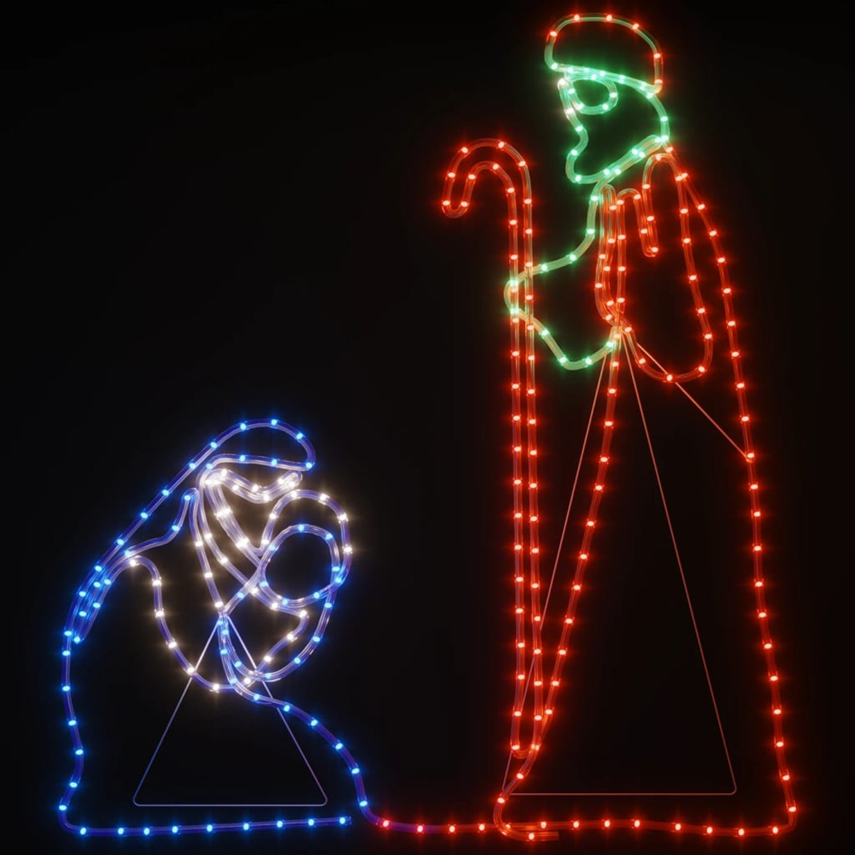 Weihnachtskrippe-Umriss in Neonlichtern vor schwarzem Hintergrund. Blau, Weiß und Rot.