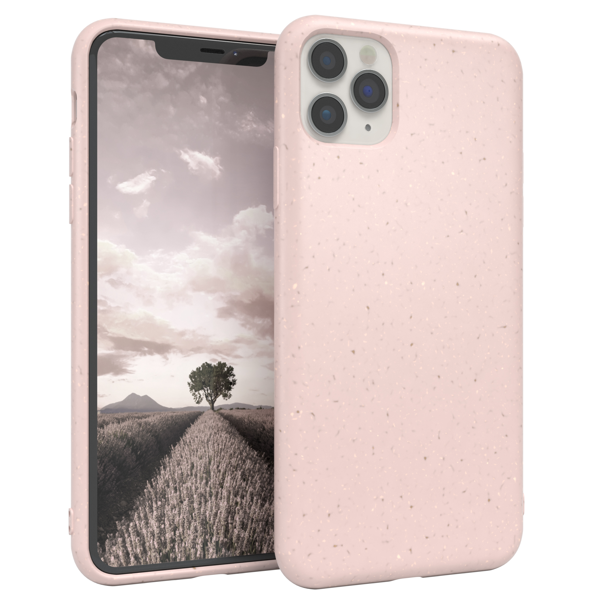Rosa Handyhülle mit Telefon auf einem Feld mit Baum und Bergen im Hintergrund.