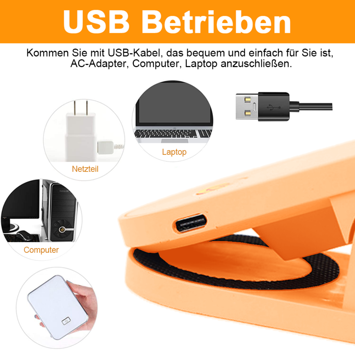 Ein orangefarbenes Gerät mit USB-Anschlüssen und Symbolen, mit einem Laptop und anderen Geräten im Hintergrund.