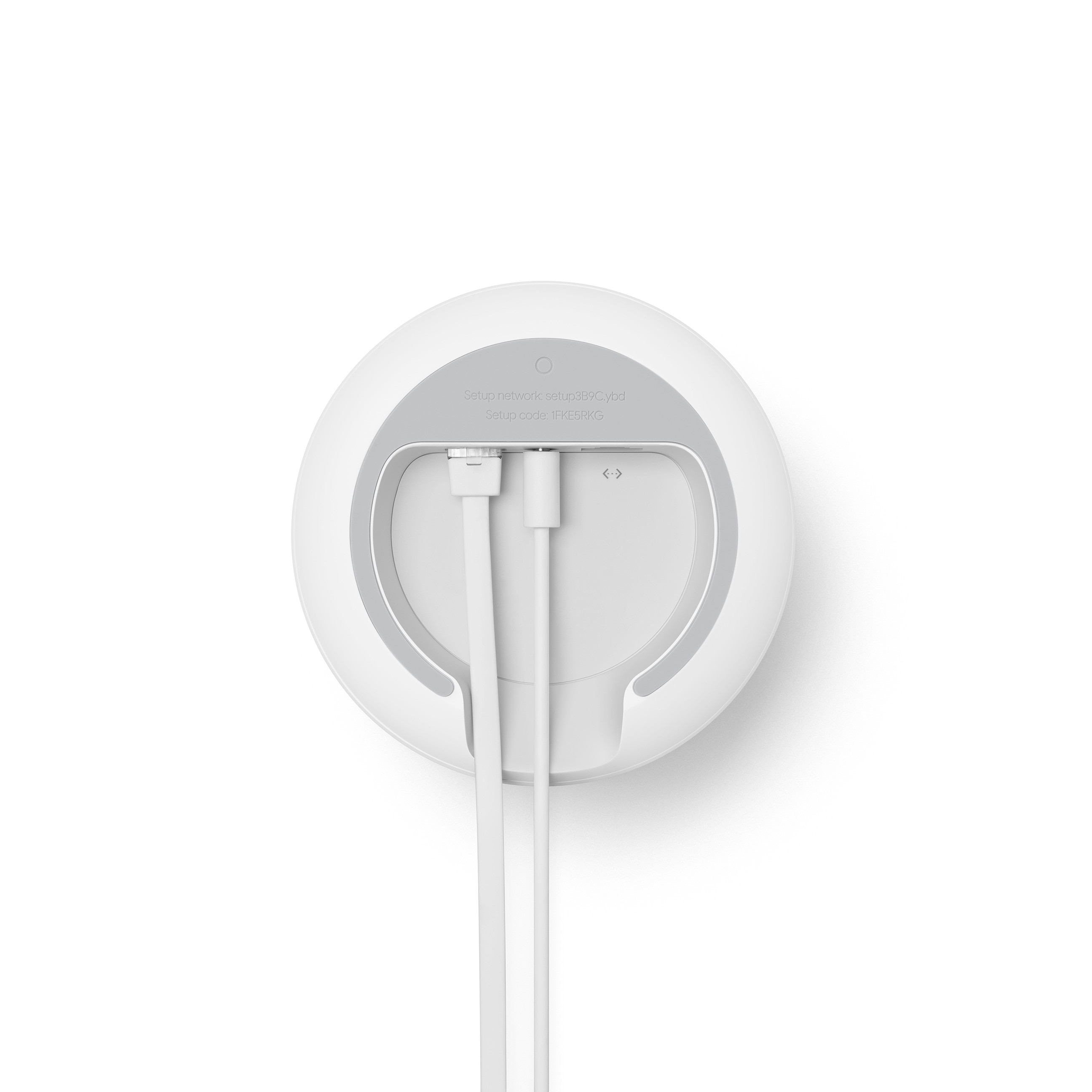 Dispositivo de red redondo, blanco, con dos cables blancos que salen de su parte inferior.